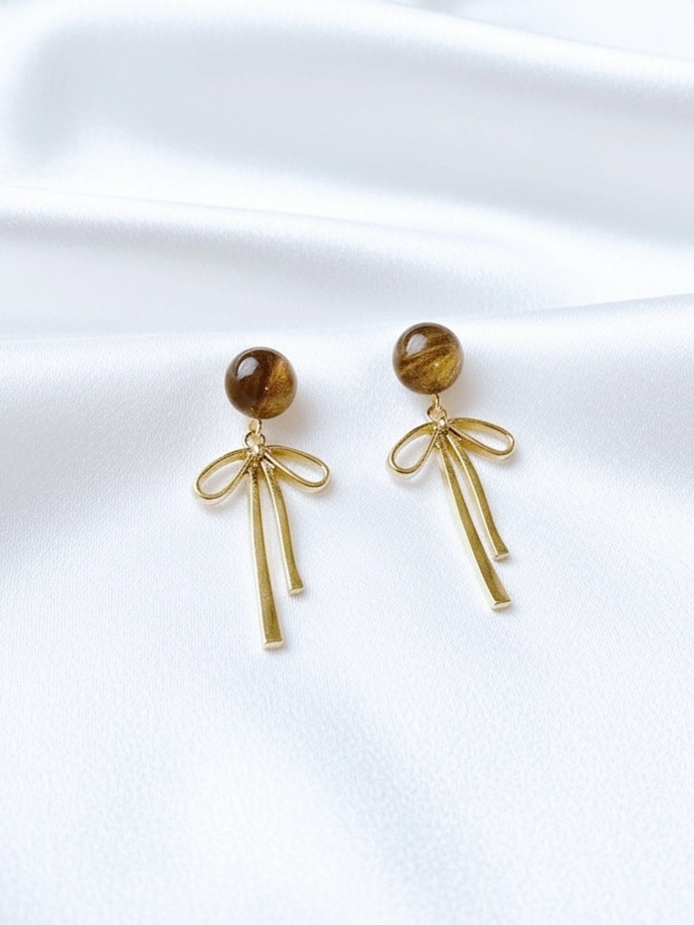 Gold Bow Drop Earrings with Brown Bead